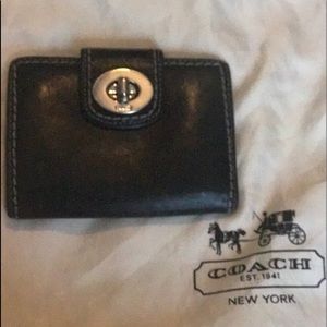 Black Coach Wallet.
